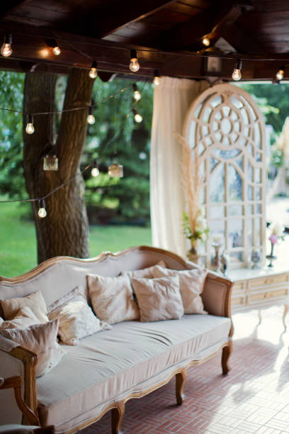 istock wedding lounge zone with sofa, boudoir table and lights 993432634