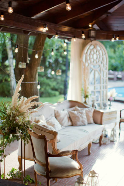 istock wedding lounge zone with sofa, boudoir table and lights 993432806