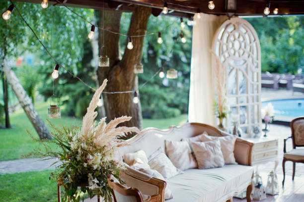 istock wedding lounge zone with sofa, boudoir table and lights 993432830