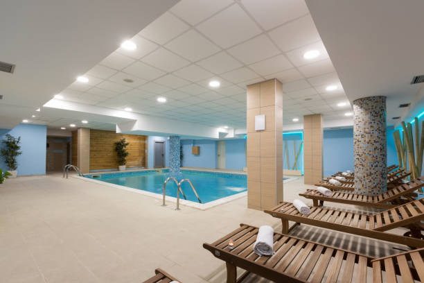 istock Indoor swimming pool in hotel spa center 993440086