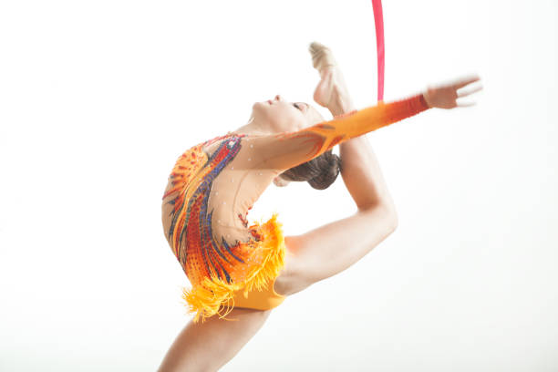 istock rhythmic gymnastics, girl with ribbon 993449856