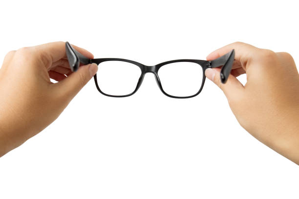 istock Hands holding glasses isolated on white background with clipping path 993454554