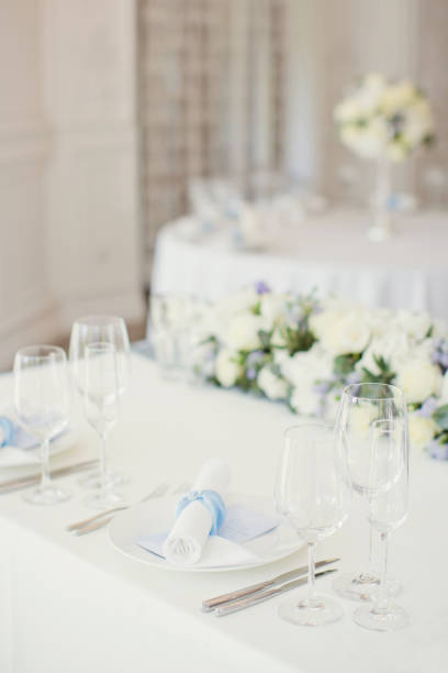istock table appointments with flowers and white and blue decorations 993454894