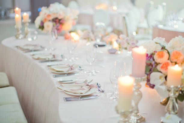 istock table appointments with flowers and candles 993457534