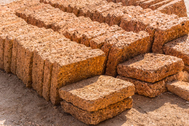 Laterite rock stone bricks plate from nature reddish rusty red color from rich in iron oxide