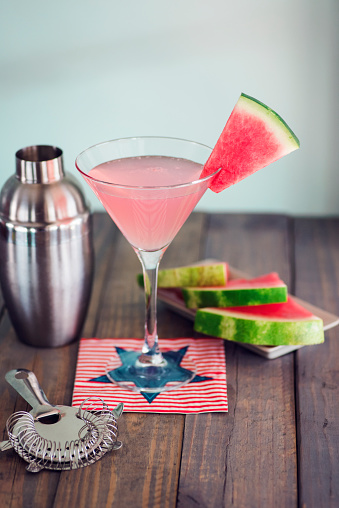 Fourth of July summer Watermelon martinis garnished with fresh watermelon slices.