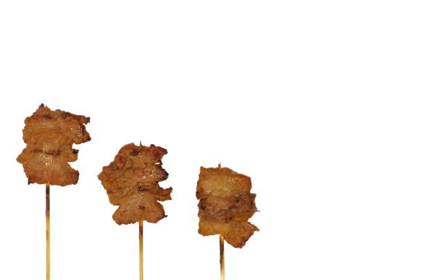 istock The grilled pork with wood stick. 993473528