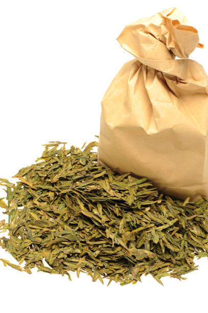 istock Chinese green tea on a white background 993473676