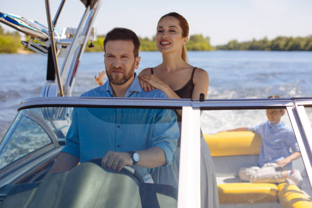 istock Pleasant young woman enjoying yacht ride 993478746