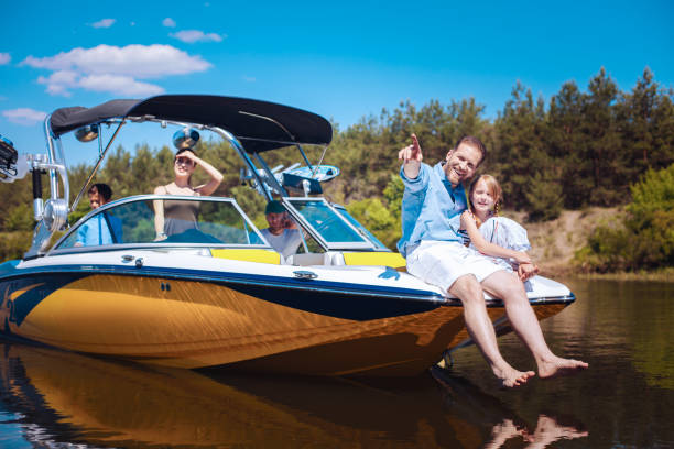 istock Pleasant young family enjoying weekend on boat 993481750