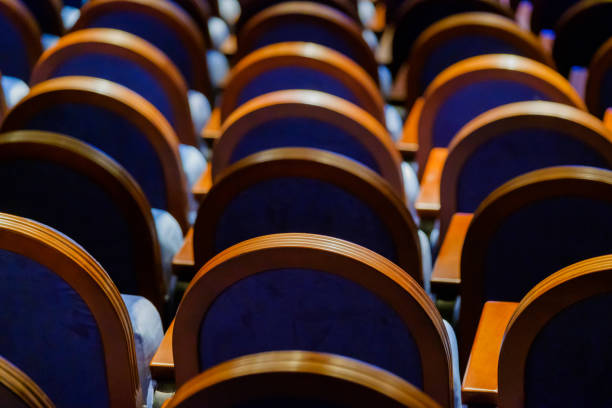istock Chairs in the row at the hall 993482492