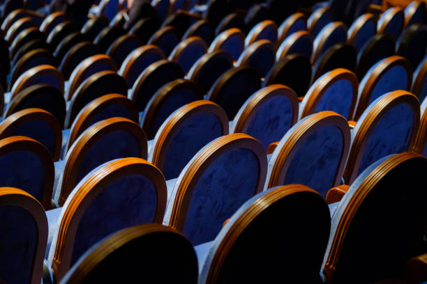 istock Chairs in the row at the hall 993482698