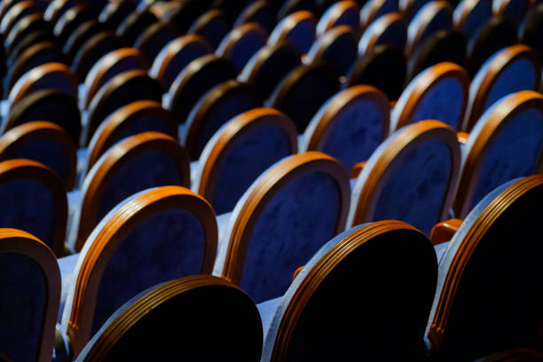 istock Chairs in the row at the hall 993482736