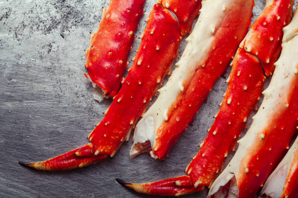 istock Cooked crab phalanx on metallic background. Top view with copy space. 993486632