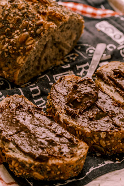 istock Slices of fresh bread with chocolate. 993489464