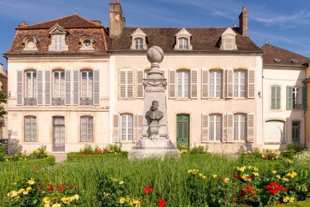 Statue and grand building in a public square