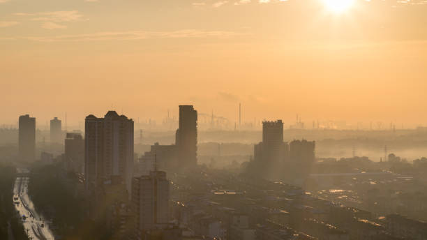 istock industrial city skyline in morning 993491378