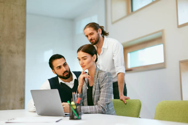 istock Business Meeting. People Work On Computer In Modern Office 993495076