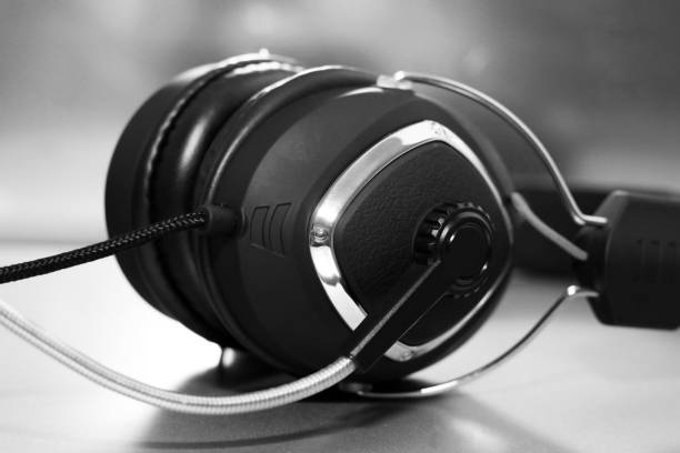 istock Large headphones on a glass surface 993497890