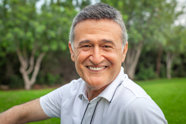 istock Happy mature male man smiling 993500246