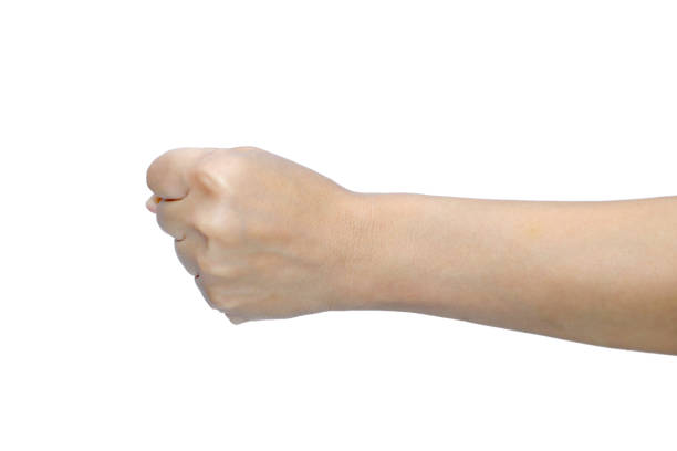 istock hand clenched in fist against white background 993500670