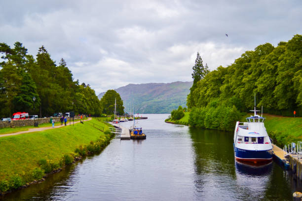 Caledonian Canal in Fort Augustus, in the Highlands (Scotland, United Kingdom) Caledonian Canal in Fort Augustus, in the Highlands (Scotland, United Kingdom) fort augustus stock pictures, royalty-free photos & images