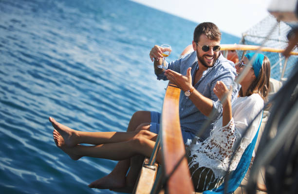 istock Couple on a sailboat. 993524666