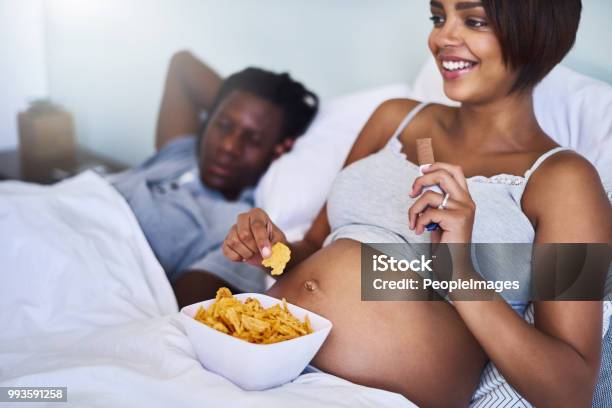 Settling My Cravings With Some Happy Snacks Stock Photo - Download Image Now - Pregnant, Eating, Potato Chip