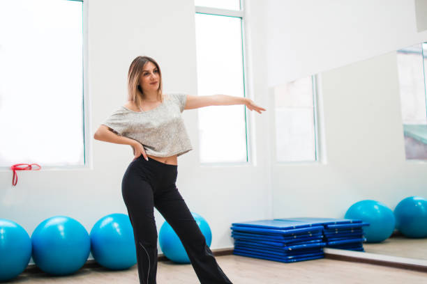 istock dancer woman dancing zumba exercises 993592772
