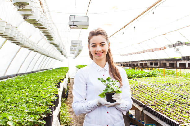 istock The student in the greenhouse explores plants 993603356