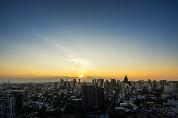 istock sunset on cityscape evening time - can use to display or montage on product 993617376