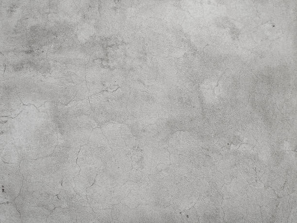 istock Cracked plaster on the wall. Grunge texture 993617878
