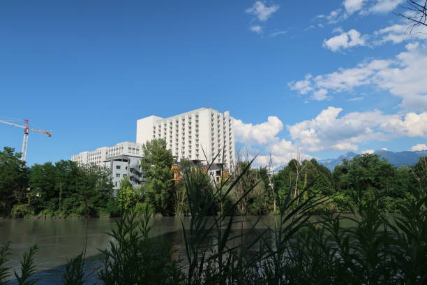 Grenoble university hospital along the Isère river stock photo