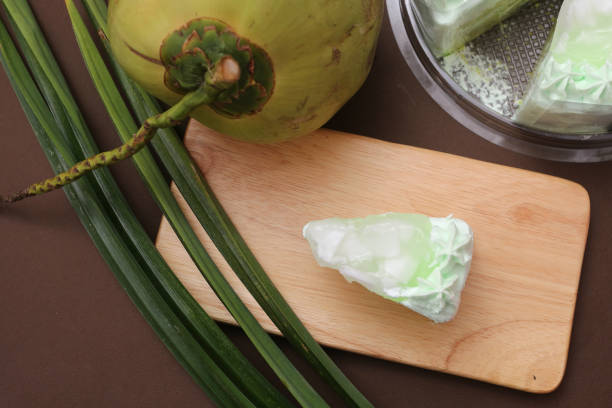 Pandan and coconut cake and white cream topping