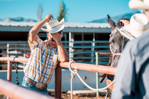 istock Cowboys getting ready for riding in rodeo arena 993630584
