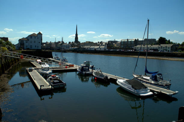 istock Boats, dinghies and yachts at a pier 993631764