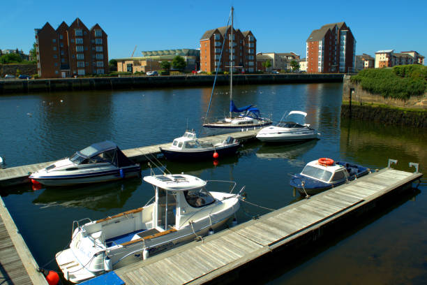 istock Boats, dinghies and yachts at a pier 993633934