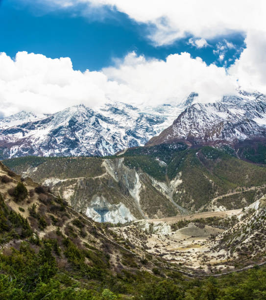 istock Mountain peaks in snow and clouds, Nepal. 993638480