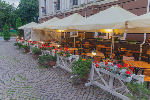 Empty street cafe and evening lighting. City