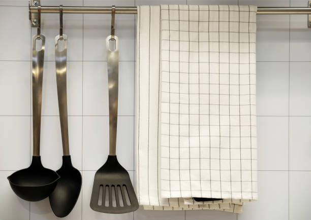 istock view of the kitchen counter with a cutting board, hanging on the wall several useful, buckets and bucket and skimmers 993642616
