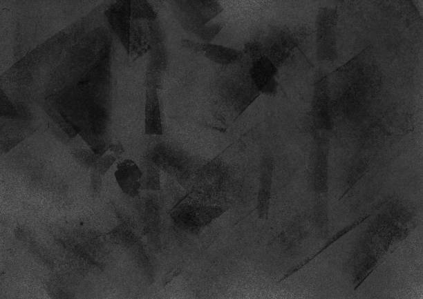 istock Black paper texture with paint strokes. Dark textured wall surface background 993642652