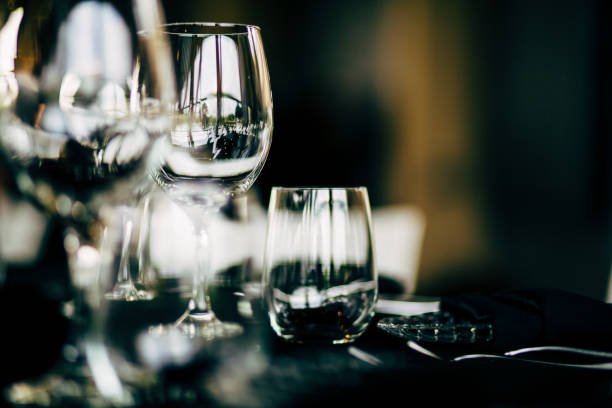 istock Luxury table settings for fine dining with and glassware, beautiful blurred  background. For events, weddings. WEDDINGS, Wedding detals and planing. 993643904