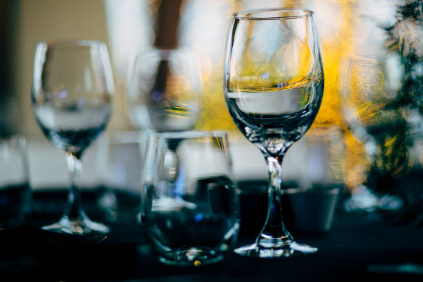 istock Luxury table settings for fine dining with and glassware, beautiful blurred  background. For events, weddings. WEDDINGS, Wedding detals and planing. 993644202