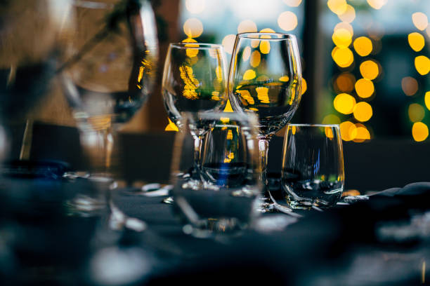 istock Luxury table settings for fine dining with and glassware, beautiful blurred  background. For events, weddings. WEDDINGS, Wedding detals and planing. 993644586