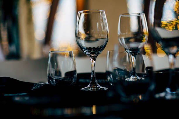 istock Luxury table settings for fine dining with and glassware, beautiful blurred  background. For events, weddings. WEDDINGS, Wedding detals and planing. 993644706