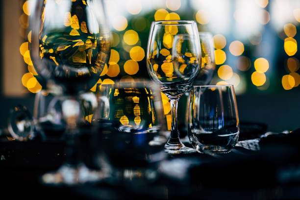 istock Luxury table settings for fine dining with and glassware, beautiful blurred  background. For events, weddings. WEDDINGS, Wedding detals and planing. 993647192