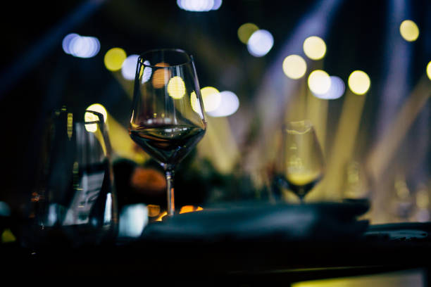 istock Luxury table settings for fine dining with and glassware, beautiful blurred  background. For events, weddings. WEDDINGS, Wedding detals and planing. 993647526