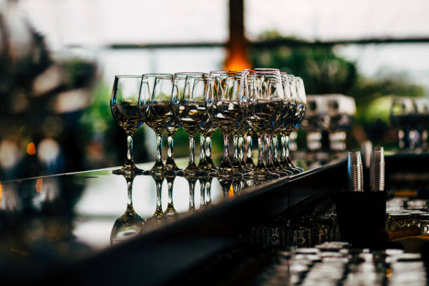 Luxury table settings for fine dining with and glassware, beautiful blurred  background. For events, weddings. WEDDINGS, Wedding detals and planing.