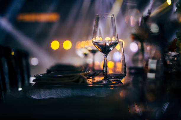istock Luxury table settings for fine dining with and glassware, beautiful blurred  background. For events, weddings. WEDDINGS, Wedding detals and planing. 993648268