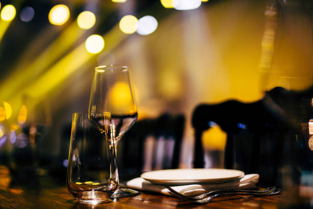 istock Luxury table settings for fine dining with and glassware, beautiful blurred  background. For events, weddings. WEDDINGS, Wedding detals and planing. 993648444